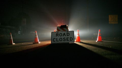 LA JOLLA INDIAN RESERVATION, CA OCTOBER 25: A California Highway Patrol cruiser sits at a closed road October 25, 2007 in Rincon, California. Over 700 firefighters are fighting the 35,000-acre Poomacha fire, which is threatening to merge the nearby 200,000-acre Witch fire. (Photo by Eric Thayer/Getty Images)