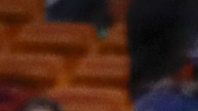 Anuel AA, cantante de género urbano, en un juego de la NBA.