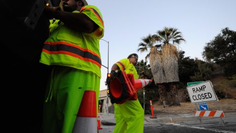 LOS ANGELES, CA - JULY 15: Construction workers shut down an on ramp to the Interstate 405 on Sepulveda Boluevard in the San Fernando Valley advising motorists of the shutdown of the freeway to demolish the Mulholland Bridge over Interstate 405 at the Sepulveda Pass on July 15, 2011 in Los Angeles, California. Los Angeles city officials are advising residents to stay home or stay away from the area during what has become known as "Carmageddon," the 11-mile shutdown of Interstate 405 for 53 hours over the weekend, for fear of massive traffic jams. (Photo by Kevork Djansezian/Getty Images)