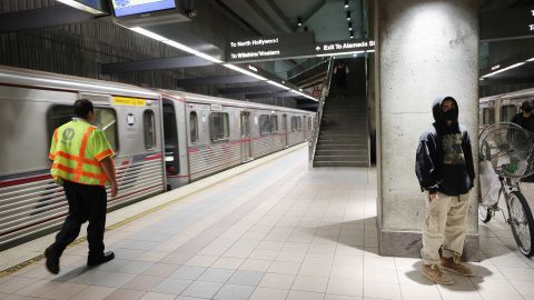 LOS ANGELES, CALIFORNIA - APRIL 01: A man wears a face mask while standing on a Los Angeles Metro Rail train platform amid the coronavirus pandemic on April 1, 2020 in Los Angeles, California. As of last week, L.A. Metro ridership was down an estimated 81 percent on rail and 68 percent on buses amid the spread of COVID-19. L.A. Metro’s trains and buses are cleaned daily and the agency is now encouraging riders to social distance and only board for ‘essential’ trips. (Photo by Mario Tama/Getty Images)