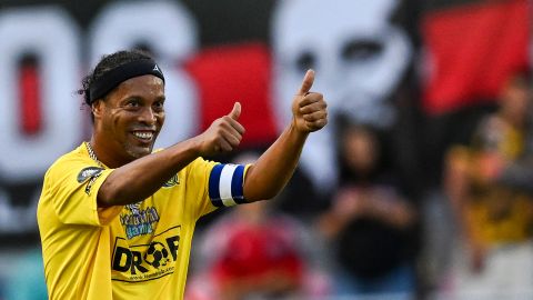 Brazilian football player Ronaldinho celebrates after scoring during "The Beautiful Game" a celebrity football match at DRV PNK stadium in Fort Lauderdale, Florida on June 18, 2022. (Photo by CHANDAN KHANNA / AFP) (Photo by CHANDAN KHANNA/AFP via Getty Images)