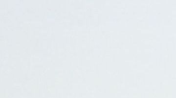 Palm trees stand above homes on the skyline in front of downtown Los Angeles after sunrise following heavy rain from winter storms, as seen from the Kenneth Hahn State Recreation Area, on March 2, 2023, in Los Angeles, California. (Photo by Patrick T. Fallon / AFP) (Photo by PATRICK T. FALLON/AFP via Getty Images)