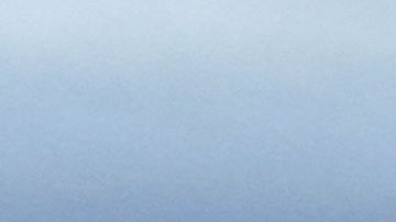 This aerial photograph shows floodwaters submerging the road to enter Pajaro, California, on March 11, 2023. - Residents were forced to evacuate in the middle of the night after an atmospheric river surge broke the the Pajaro Levee and sent flood waters flowing into the community. (Photo by JOSH EDELSON / AFP) (Photo by JOSH EDELSON/AFP via Getty Images)