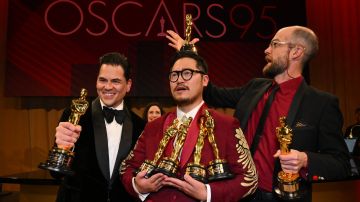 US producer Jonathan Wang (L), winner of the Oscar for Best Picture for "Everything Everywhere All at Once", US director Daniel Kwan (C) and US director Daniel Scheinert (R), winners of the Oscar for Best Director for "Everything Everywhere All at Once", attend the 95th Annual Academy Awards Governors Ball in Hollywood, California on March 12, 2023. (Photo by ANGELA WEISS / AFP) (Photo by ANGELA WEISS/AFP via Getty Images)