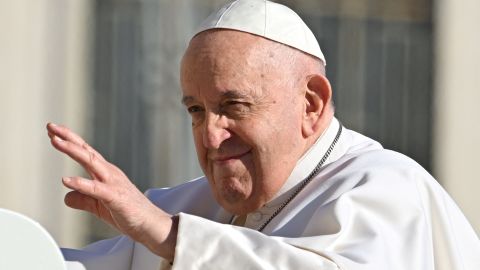 Pope Francis waves as he arrives to lead his weekly open-air general audience at St.Peters' square in the Vatican, on March 15, 2023. (Photo by Alberto PIZZOLI / AFP) (Photo by ALBERTO PIZZOLI/AFP via Getty Images)