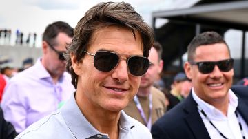 NORTHAMPTON, ENGLAND - JULY 03: Actor Tom Cruise walks in the Paddock prior to the F1 Grand Prix of Great Britain at Silverstone on July 03, 2022 in Northampton, England. (Photo by Clive Mason/Getty Images)