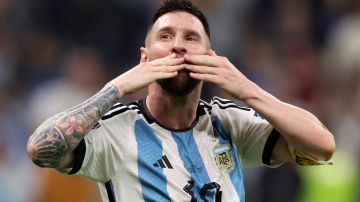 LUSAIL CITY, QATAR - DECEMBER 13: Lionel Messi celebrates after their sides third goal by Julian Alvarez of Argentina during the FIFA World Cup Qatar 2022 semi final match between Argentina and Croatia at Lusail Stadium on December 13, 2022 in Lusail City, Qatar. (Photo by Clive Brunskill/Getty Images)