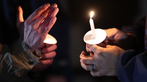 MEMPHIS, TENNESSEE - JANUARY 26: People light candles as they attend a candlelight vigil in memory of Tyre Nichols at the Tobey Skate Park on January 26, 2023 in Memphis, Tennessee. 29-year-old Tyre Nichols died from his injuries three days after being severely beaten by five Memphis police officers on January 7. The officers have since been fired with criminal charges against the officers announced today. The video of the police encounter is expected to be released on Friday. (Photo by Scott Olson/Getty Images)