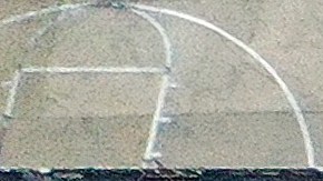 MONTEBELLO, CALIFORNIA - MARCH 22: An aerial view of roof damage after a rare possible tornado touched down and ripped up building roofs in a Los Angeles suburb on March 22, 2023 in Montebello, California. Another Pacific storm has been pounding California with heavy rain, high winds, and snow. (Photo by Mario Tama/Getty Images)