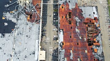 MONTEBELLO, CALIFORNIA - MARCH 22: An aerial view of roof damage after a rare possible tornado touched down and ripped up building roofs in a Los Angeles suburb on March 22, 2023 in Montebello, California. Another Pacific storm has been pounding California with heavy rain, high winds, and snow. (Photo by Mario Tama/Getty Images)