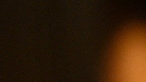 Imagen del presidente de la Fed, Jerome Powell, usando un traje oscuro y de perfil.