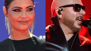 Chiquinquirá Delgado, presentadora venezolana/ Pitbull, cantante de género urbano en los Latin AMA's 2023.