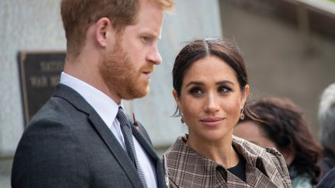 WELLINGTON, NZ - OCTOBER 28: Prince Harry, Duke of Sussex and Meghan, Duchess of Sussex lay ferns and a wreath at the tomb of the Unknown Warrior at the newly unveiled UK war memorial and Pukeahu National War Memorial Park, on October 28, 2018, in Wellington, New Zealand. The Duke and Duchess of Sussex are on their official 16-day Autumn tour visiting cities in Australia, Fiji, Tonga and New Zealand. (Photo by Rosa Woods - Pool/Getty Images)