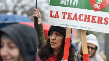 Striking teachers are joined by parents and students on the picket line outside Dahlia Heights Elementary School in the Eagle Rock section of Los Angeles, California on the third day of the teachers strike, on January 16, 2019. - Teachers of the Los Angeles Unified School District (LAUSD), the second largest public school district in the United States, are striking for smaller class size, better school funding and higher teacher pay. (Photo by Robyn Beck / AFP) (Photo credit should read ROBYN BECK/AFP via Getty Images)