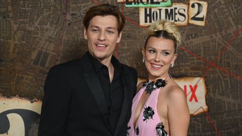 Jake Bongiovi (L) and British actress Millie Bobby Brown arrive for the premiere of Netflix's "Enola Holmes 2" at The Paris Theatre in New York City on October 27, 2022. (Photo by ANGELA WEISS / AFP) (Photo by ANGELA WEISS/AFP via Getty Images)