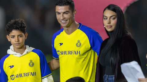 RIYADH, SAUDI ARABIA - JANUARY 03: Cristiano Ronaldo accompanied by his partner Georgina Rodriguez and his son Cristiano Ronaldo Jr, greet the crowd during the official unveiling of Cristiano Ronaldo as an Al Nassr player at Mrsool Park Stadium on January 3, 2023 in Riyadh, Saudi Arabia. (Photo by Yasser Bakhsh/Getty Images)