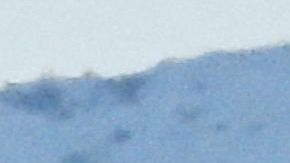 Snow capped mountains stand on the skyline behind a view of the Hollywood sign following heavy rain from winter storms, as seen from the Kenneth Hahn State Recreation Area, on March 2, 2023, in Los Angeles, California. (Photo by Patrick T. Fallon / AFP) (Photo by PATRICK T. FALLON/AFP via Getty Images)