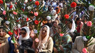 Christian devotees attend a Palm Sunday mass at the St Anthony's Church in Lahore on April 2, 2023. (Photo by Arif ALI / AFP) (Photo by ARIF ALI/AFP via Getty Images)