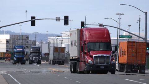 OAKLAND, CALIFORNIA - MARCH 31: Trucks drive through the Port of Oakland on March 31, 2023 in Oakland, California. The U.S. Environmental Protection Agency (EPA) announced that it will allow California's plan to phase out a variety of diesel-powered trucks in the state and require truck manufacturers to sell more zero-emission electric trucks. Half of all heavy trucks sales of heavy truck in California will have to be electric by 2035. (Photo by Justin Sullivan/Getty Images)