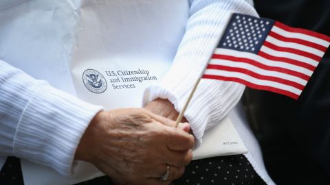 CHICAGO, IL - SEPTEMBER 16: Immigrants from 25 countries participate in a naturalization ceremony in Daley Plaza on September 16, 2014 in Chicago, Illinois. Seventy people were awarded their U.S. citizenship at the Citizenship Day ceremony. (Photo by Scott Olson/Getty Images)