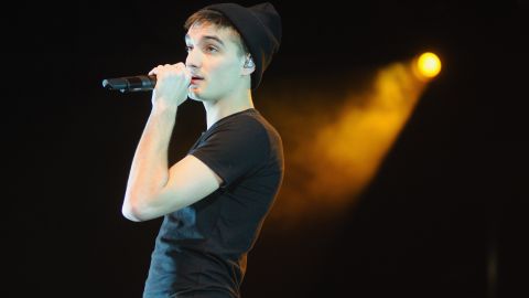 CHICAGO, IL - DECEMBER 14: Tom Parker of The Wanted performs during the B96 Pepsi Jingle Bash at Allstate Arena on December 14, 2013 in Chicago, Illinois. (Photo by Timothy Hiatt/Getty Images for Radio.com)