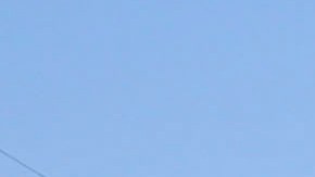 Police officers investigate the scene near Pearson Park in Anaheim, California, February 27, 2016, after three counter-protesters were stabbed while clashing with Ku Klux Klan members staging a rally. Thirteen people were arrested. / AFP / RINGO CHIU (Photo credit should read RINGO CHIU/AFP via Getty Images)