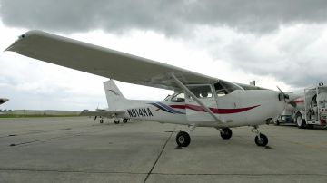 VENICE, UNITED STATES: A Cessna Skyhawk single engine plane sits on the runway at the Huffman Aviation airfield 12 September 2001 in Venice, Florida. The Cessna Skyhawk single engine plane is one of the two airplanes used in the training of two suspected terrorists linked to the World Trade Center attack, according to Rudi Deckkers, president and owner of Huffman Aviation. AFP PHOTO/Peter MUHLY (Photo credit should read PETER MUHLY/AFP via Getty Images)
