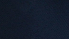 ALAMEDA, CA - JULY 03: An immigrant holds an American flag before being sworn in as an American citizen during a naturalization ceremony on the flight deck of the USS Hornet on July 3, 2018 in Alameda, California. 76 immigrants from 31 countries were sworn in as American citizens during a ceremony aboard the historic USS Hornet aircraft carrier. (Photo by Justin Sullivan/Getty Images)