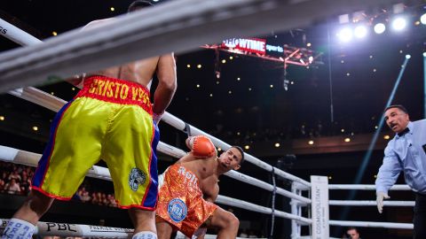 Ismael Barroso (i) vs. Rolly Romero (d).