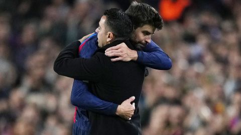 Gerard Piqué y Xavi Hernández.