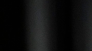 Gilbert Urbina y Bryan Battle (azul) intercambian golpes.