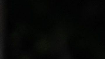 A homeless person lies in their tent on the sidewalk in front of the non-profit Midnight Mission's headquarters, while traditional Thanksgiving meals are served to nearly 2000 homeless people in the Skid Row neighborhood of downtown Los Angeles on November 25, 2021. (Photo by Apu GOMES / AFP) (Photo by APU GOMES/AFP via Getty Images)