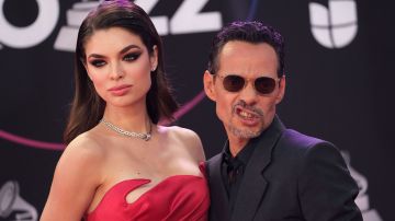 US singer Marc Anthony (R) and Paraguayan model Nadia Ferreira arrive for the 23rd Annual Latin Grammy awards at the Mandalay Bay's Michelob Ultra Arena in Las Vegas, Nevada, on November 17, 2022. (Photo by Chris DELMAS / AFP) (Photo by CHRIS DELMAS/AFP via Getty Images)