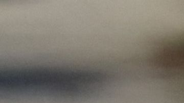 An unhoused person sits next to their tent along Glendale Boulevard in Los Angeles, California, December 19, 2022. - A state of emergency over spiraling levels of homelessness was declared in Los Angeles on Monday as the new mayor pledged a "seismic shift" for one of the most intractable problems in America's second biggest city. Tens of thousands of people sleep rough on Los Angeles streets every night, in an epidemic that shocks many visitors to one of the wealthiest urban areas on the planet. (Photo by DAVID SWANSON / AFP) (Photo by DAVID SWANSON/AFP via Getty Images)