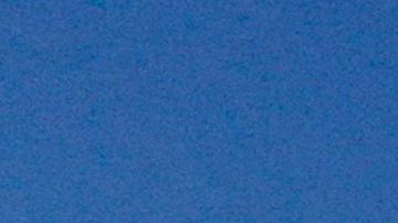 An aerial image taken on February 8, 2023 shows vehicles driving across the 6th Street Viaduct towards the downtown Los Angeles skyline in Los Angeles, California. - The $588-million bridge spans across the Los Angeles River to connect the Arts District with the Boyle Heights neighborhood east of downtown and became a popular location for street racing and daredevil social media activity, requiring additional fencing and traffic enforcement. (Photo by Patrick T. Fallon / AFP) (Photo by PATRICK T. FALLON/AFP via Getty Images)