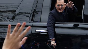 FAIRFAX, VIRGINIA - MAY 27: Actor Johnny Depp waves to supporters from his vehicle as he leaves a Fairfax County Courthouse May 27, 2022 in Fairfax, Virginia. Jury has started deliberation in the Depp v. Heard defamation trial, brought by Johnny Depp against his ex-wife Amber Heard. (Photo by Alex Wong/Getty Images)