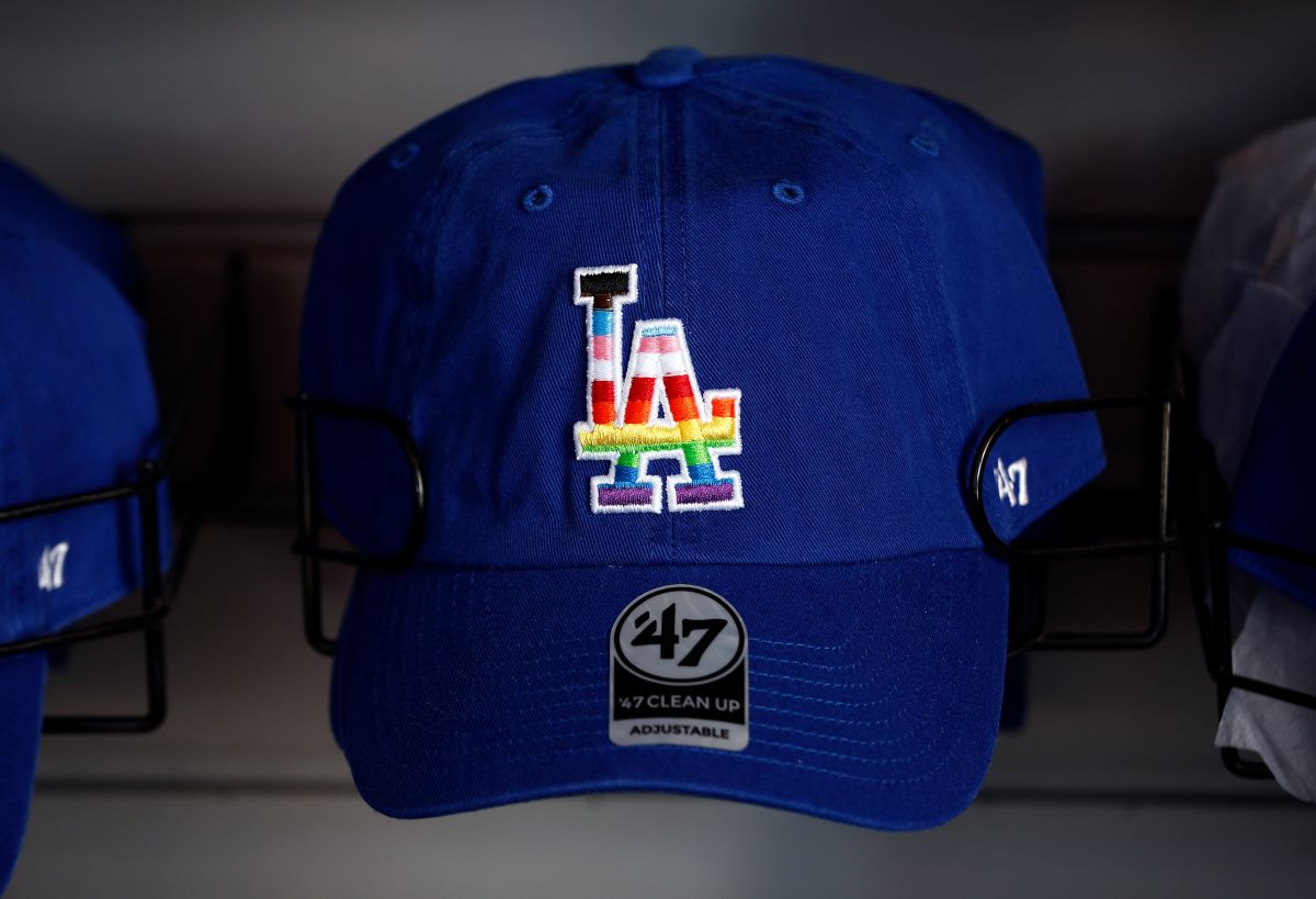 LOS ANGELES, CALIFORNIA - JUNE 03: A Los Angeles Dodgers hat on LGBTQ+ Pride Night at Dodger Stadium on June 03, 2022 in Los Angeles, California.  (Photo by Ronald Martinez/Getty Images)