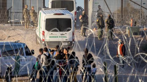 EL PASO, TEXAS - MAY 09: A U.S. Border Patrol vehicles take away groups of vulnerable immigrants, including unaccompanied minors who had crossed over from Mexico on May 09, 2023 in El Paso, Texas. A surge of immigrants is expected with the end of the U.S. government's Covid-era Title 42 policy, which for the past three years has allowed for the quick expulsion of irregular migrants entering the country. (Photo by John Moore/Getty Images)