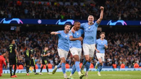 MANCHESTER, ENGLAND - MAY 17: Manuel Akanji celebrates with Erling Haaland of Manchester City after scoring the team's third goal during the UEFA Champions League semi-final second leg match between Manchester City FC and Real Madrid at Etihad Stadium on May 17, 2023 in Manchester, England. (Photo by Michael Regan/Getty Images)