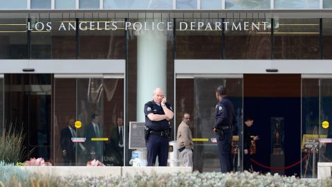 LOS ANGELES, CA - FEBRUARY 07: Los Angeles Police Department officers are deployed around the police headquarters on February 7, 2013 in Los Angeles, California. A former Los Angeles police officer Christopher Jordan Dorner, 33, who had allegedly warned he would target law enforcement, is suspected of firing on two LAPD officers and ambushing two other officers, killing one. Dorner is also a suspect in two weekend killings of Monica Quan and Keith Lawrence who were found dead in a car inside a parking structure. (Photo by Kevork Djansezian/Getty Images)