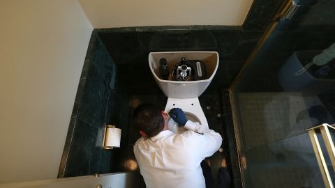 NOVATO, CA - FEBRUARY 05: Benjamin Franklin Plumbing technician Todd Snider installs a 0.8 gallon per flush ultra-low flow toilet at a home on February 5, 2014 in Novato, California. Californians are installing water saving devices in their homes like low flow toilets, shower heads and aerators as residents are being asked to voluntarily reduce water by twenty percent as California is experiencing its driest year on record. Some counties have imposed mandatory reductions in water use and have banned watering of lawns. California Gov. Jerry Brown officially declared a drought emergency earlier in the month to speed up assistance to local governments, streamline water transfers and potentially ease environmental protection requirements for dam releases. (Photo by Justin Sullivan/Getty Images)