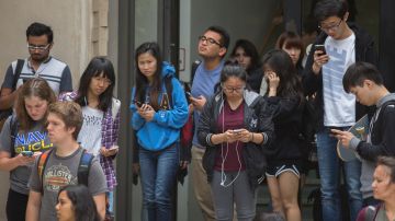 LOS ANGELES, CA - JUNE 01: Students emerge from sheltering in place after a campus shooting occurred at UCLA on June 1, 2016 in Los Angeles, California. Two men were killed in a murder-suicide in an engineering building, prompting fears of possible active shooters and a massive sweep of the university. (Photo by David McNew/Getty Images)