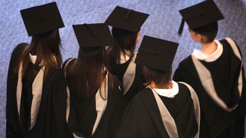 BIRMINGHAM, ENGLAND - JULY 14: Students at the University of Birmingham take part in their degree congregations as they graduate on July 14, 2009 in Birmingham, England. Over 5000 graduates will be donning their robes this week to collect their degrees from The University of Birmingham. A recent survey suggested that there are 48 graduates competing for every job. (Photo by Christopher Furlong/Getty Images)