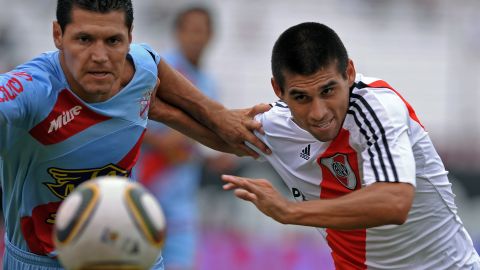 Javier Yacuzzi (izquierda) ganó la Copa Sudamericana con Arsenal.