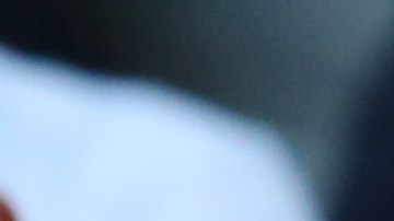 David Beckham junto a su hija Harper en un partido de fútbol.