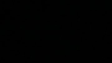 A mourner holds a candle at the synagogue in Halle and der Saale, eastern Germany, on October 10, 2019 one day after the deadly anti-Semitic shooting. - Two people were shot dead in the eastern German city of Halle on October 9, 2019, with a synagogue as the prime target on Yom Kippur. The suspect, 27-year-old German Stephan Balliet, filmed the assault and live-streamed it. (Photo by Ronny Hartmann / AFP) (Photo by RONNY HARTMANN/AFP via Getty Images)