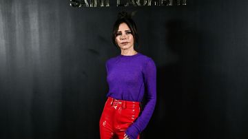 British singer and stylist Victoria Beckham poses for a photocall prior the Saint-Laurent Fall-Winter 2022-2023 collection fashion show during the Paris Womenswear Fashion Week, in Paris, on March 1, 2022. (Photo by STEPHANE DE SAKUTIN / AFP) (Photo by STEPHANE DE SAKUTIN/AFP via Getty Images)