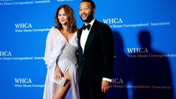 US model and media personality Chrissy Teigen (L) and US musician John Legend arrive for the White House Correspondents' Association dinner at the Washington Hilton in Washington, DC, April 29, 2023. (Photo by Stefani Reynolds / AFP) (Photo by STEFANI REYNOLDS/AFP via Getty Images)