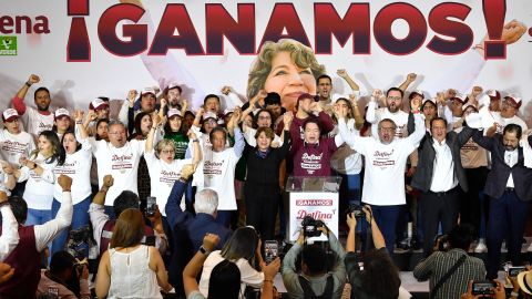 Delfina Gomez (C), candidate for governor for the State of Mexico for a coalition led by the ruling Morena political party, unofficially celebrates being elected governor of the State of Mexico in Toluca, Mexico State, on June 4, 2023. The vote is a test of the popularity of President Andres Manuel Lopez Obrador's ruling Morena party ahead of presidential elections next year. The State of Mexico is in many ways a microcosm of the country: half of its population lives in poverty. (Photo by CLAUDIO CRUZ / AFP) (Photo by CLAUDIO CRUZ/AFP via Getty Images)