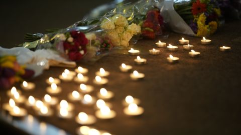 NOTTINGHAM, ENGLAND - JUNE 13: Flowers and candles lay at the altar after being placed by friends of the deceased during a vigil at St Peter’s Church in the city centre on June 13, 2023 in Nottingham, England. Nottinghamshire police said a man had been arrested on suspicion of murder after three people were found dead earlier today in areas of Nottingham City Centre. (Photo by Christopher Furlong/Getty Images)